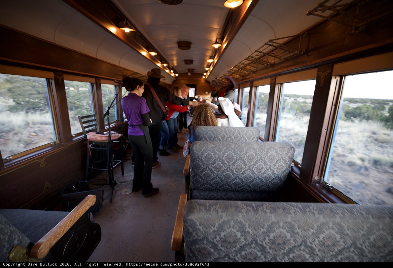 Scenic Train Journey Through Desert Landscape at Dusk