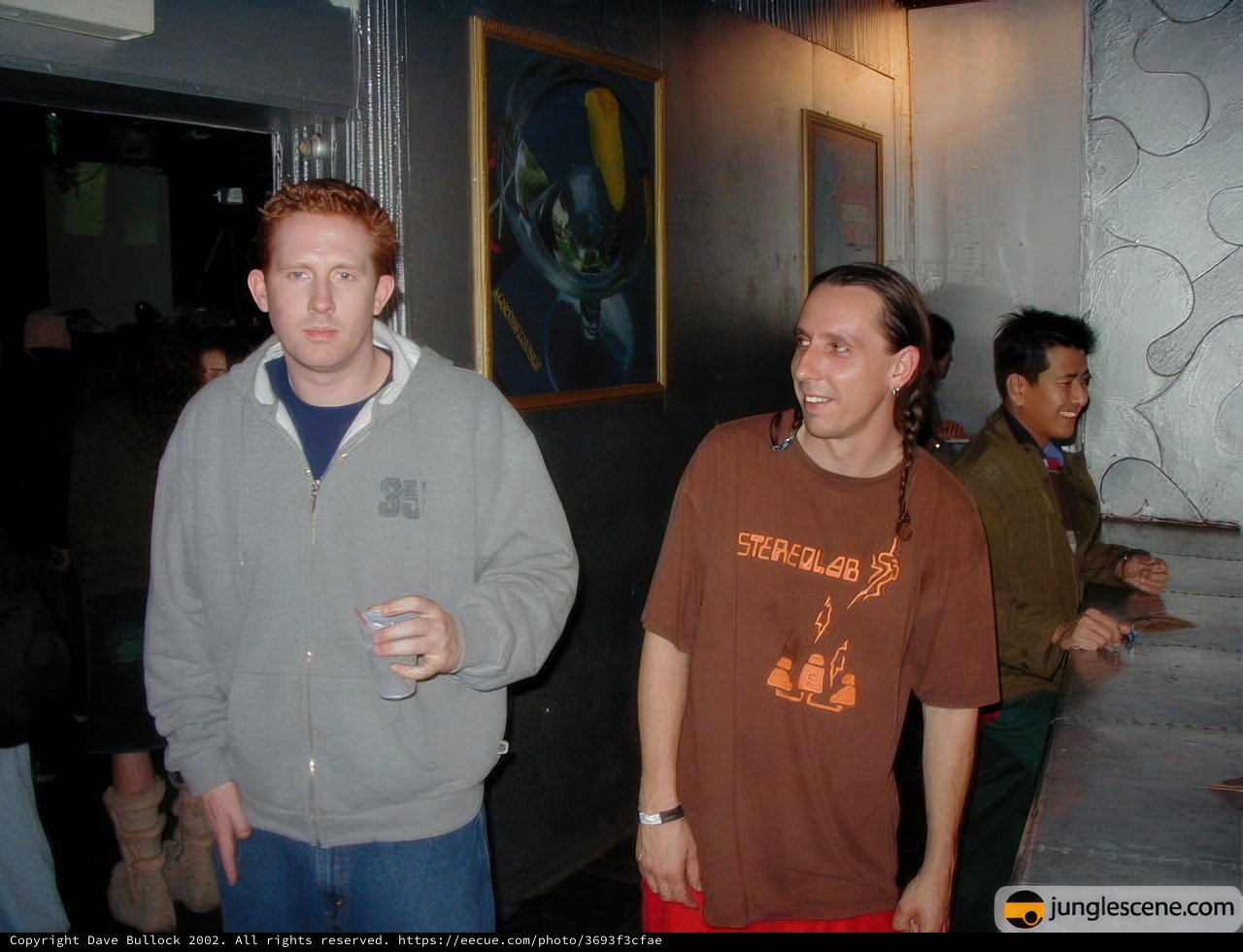 Two Men Pause to Admire Artwork