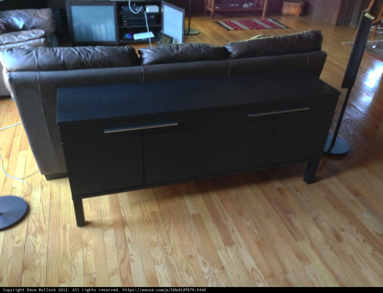 Black Sideboard with Drawers in a Chic Living Room