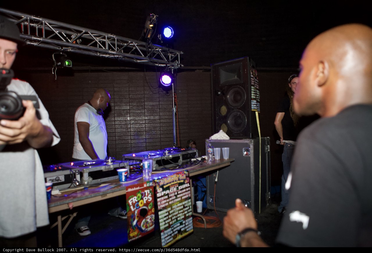 MC Q spinning on the turntables