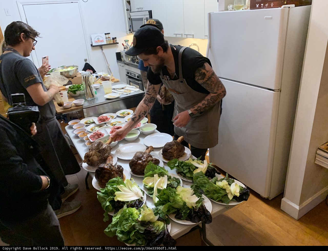 Tattooed Chef Prepares Delicious Meal in Kitchen