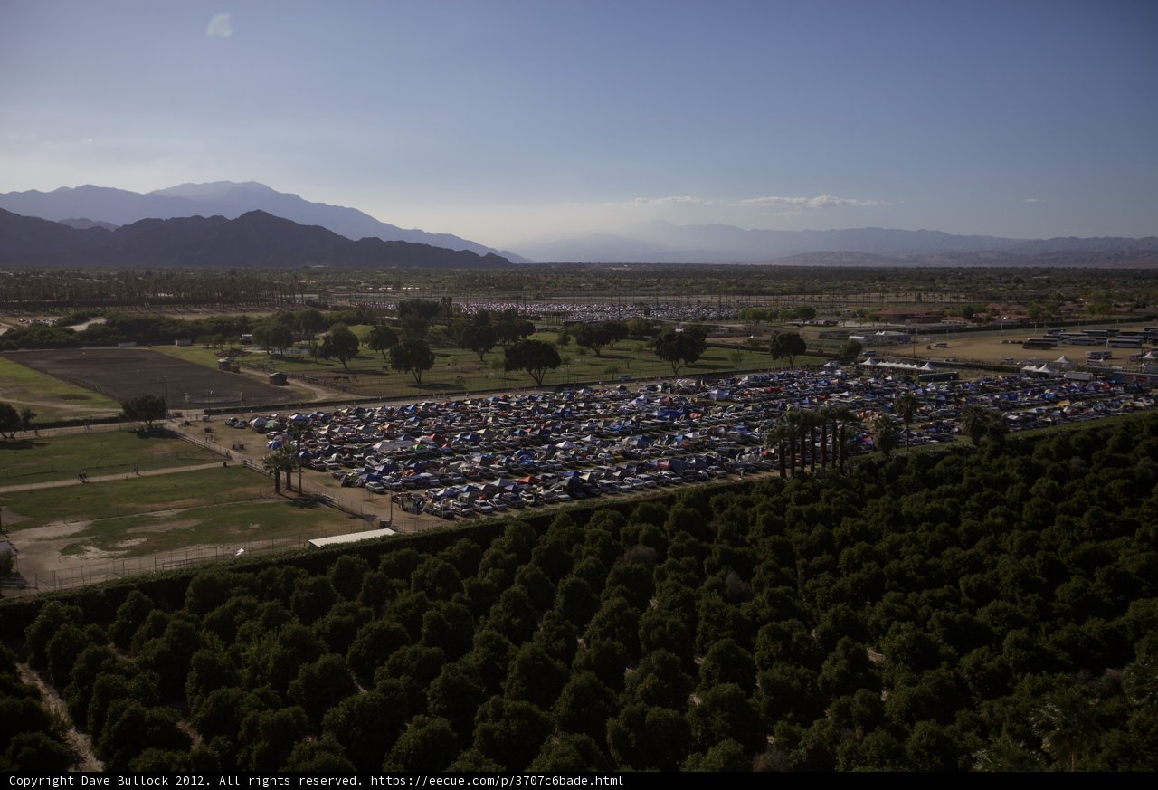 Aerial view of Coachella parking lot surrounded by trees