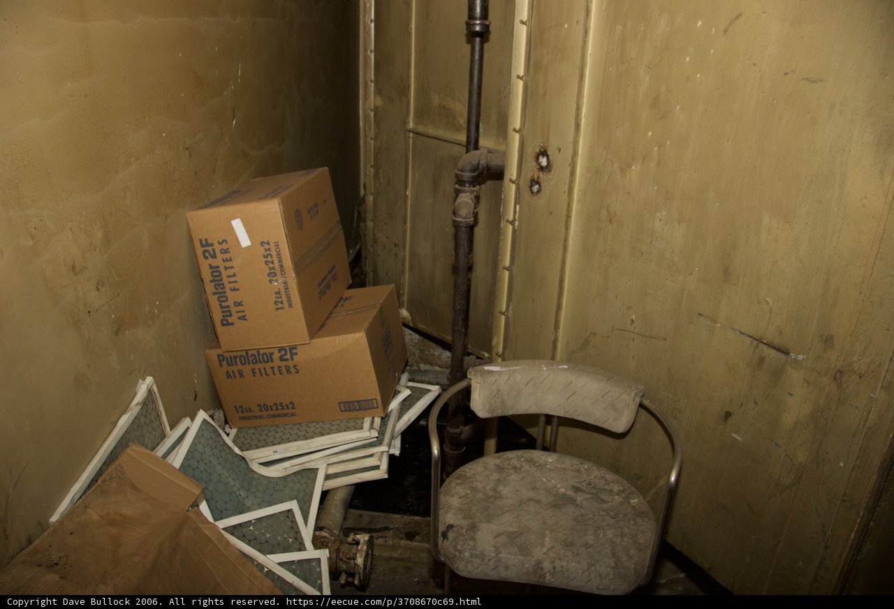 Boxes and Chair in an Indoor Room