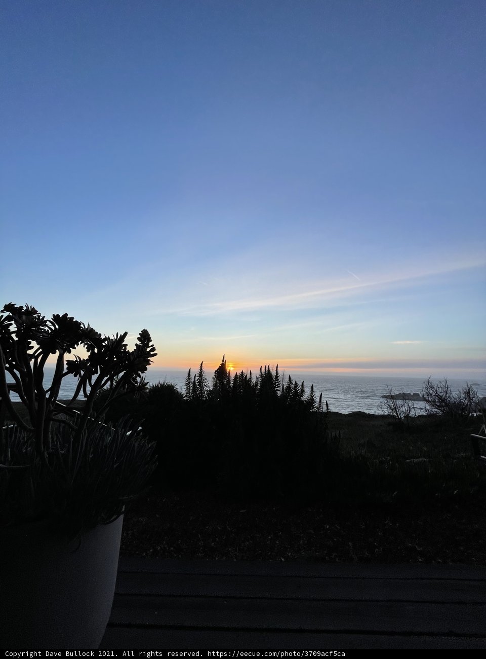 Sunset over the Ocean from a Deck