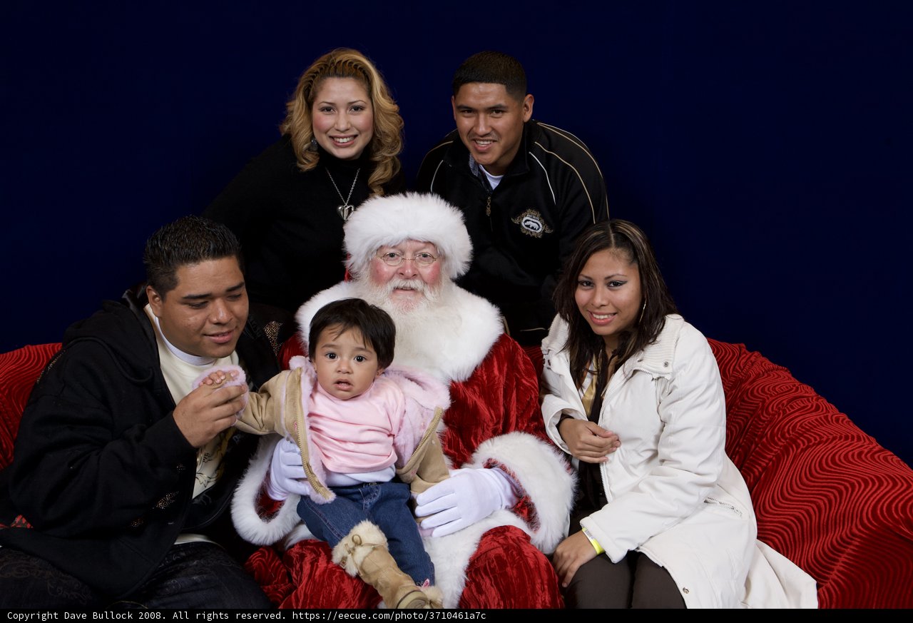 A Festive Family Photo with Santa Claus