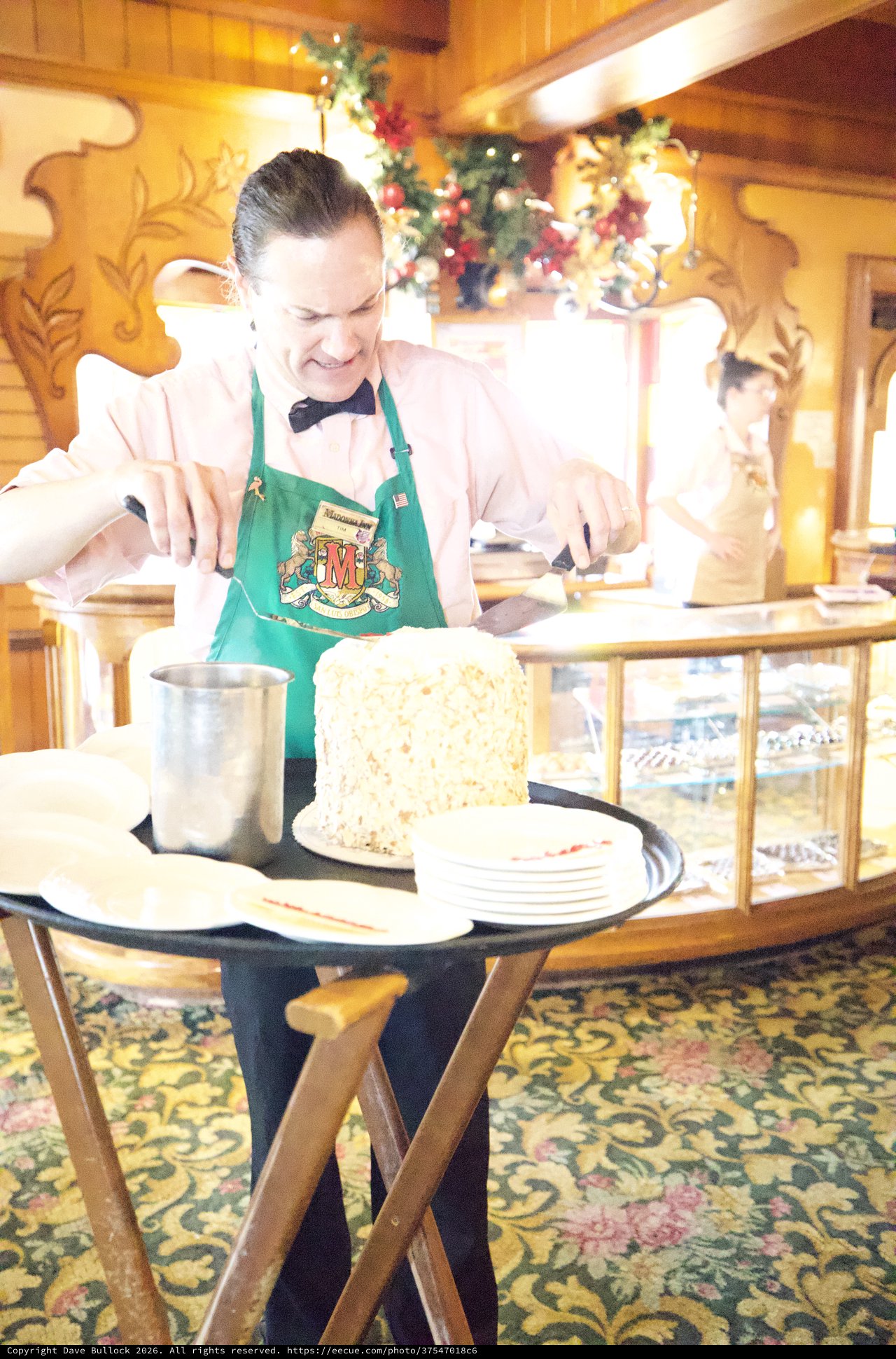 Server Preparing Dessert Tableside at Holiday Restaurant