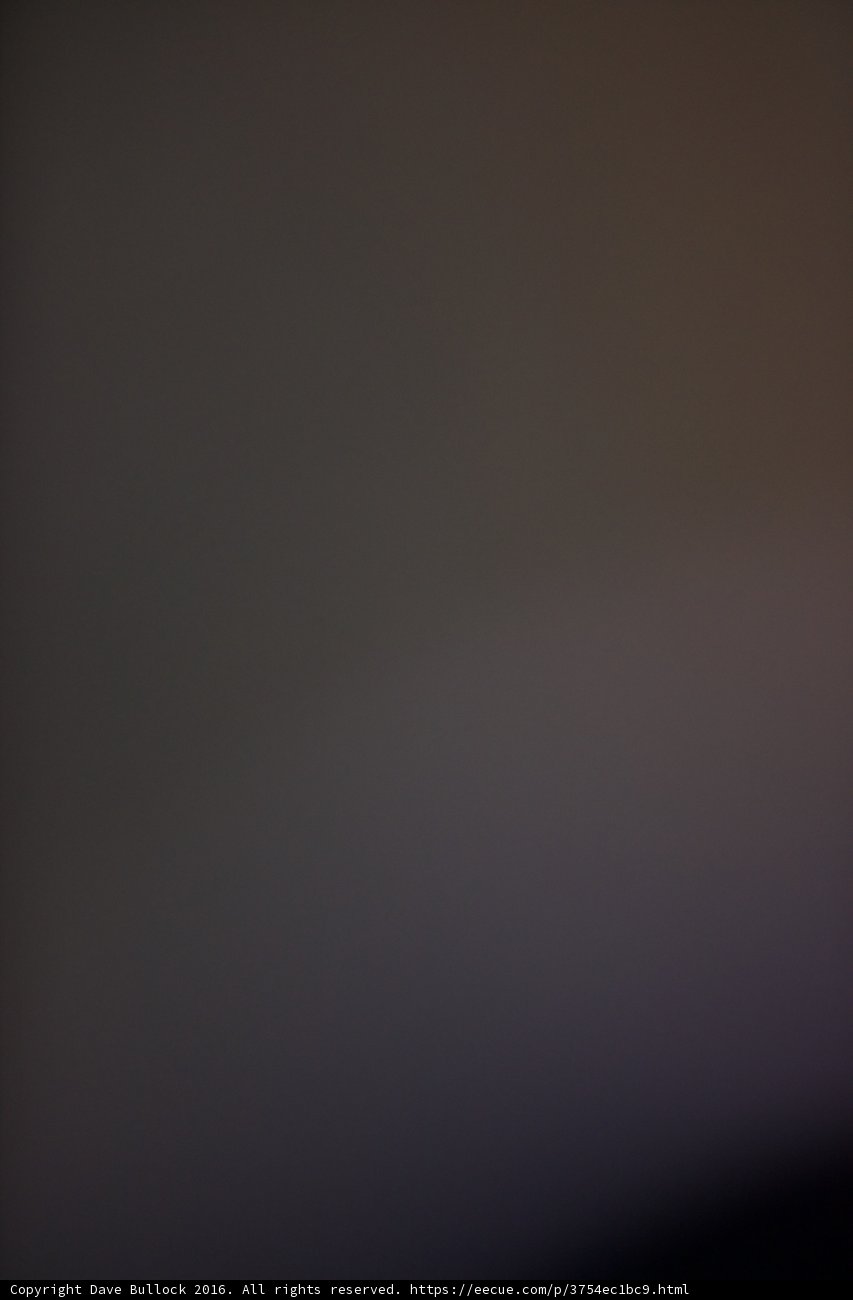 Blurry Plane Against Dark Sky