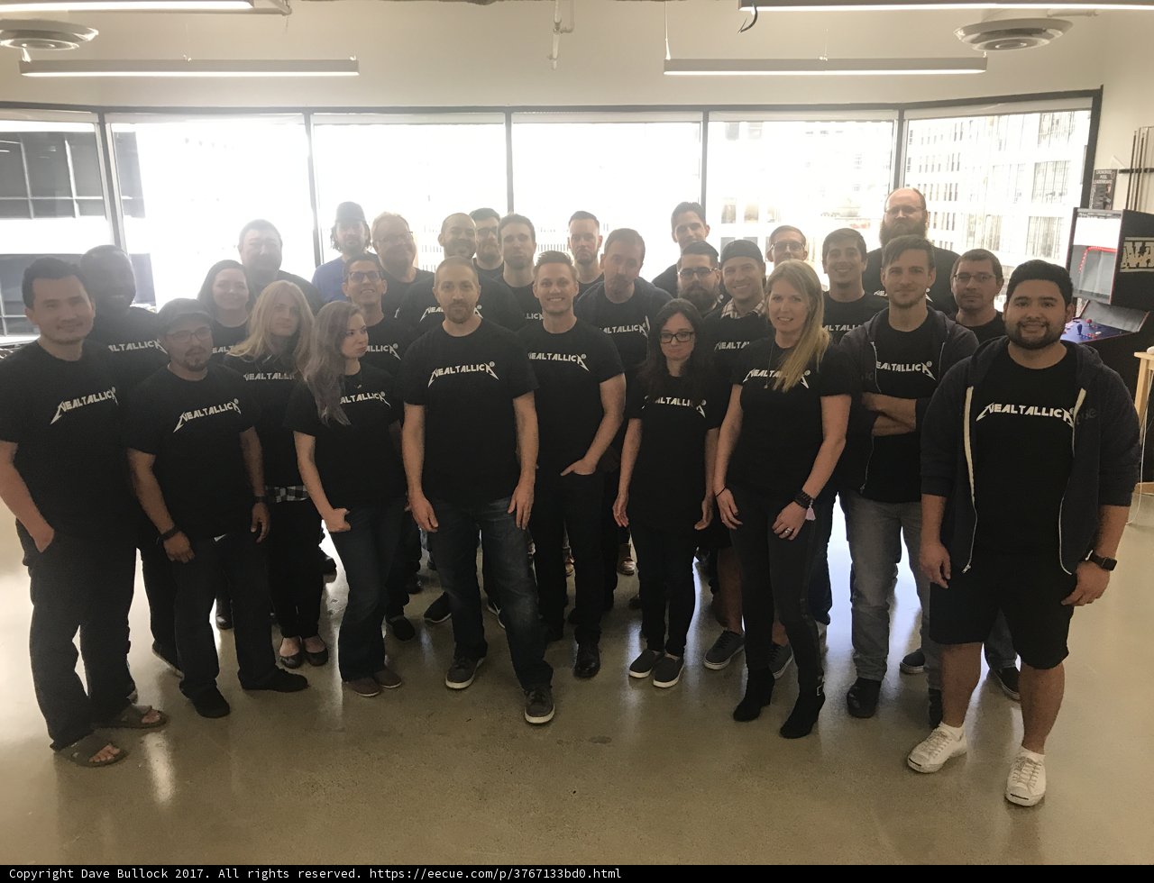 Group of People in Black Shirts