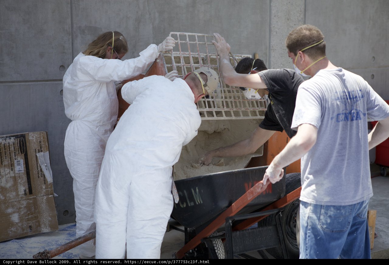 Working on a Cement Block