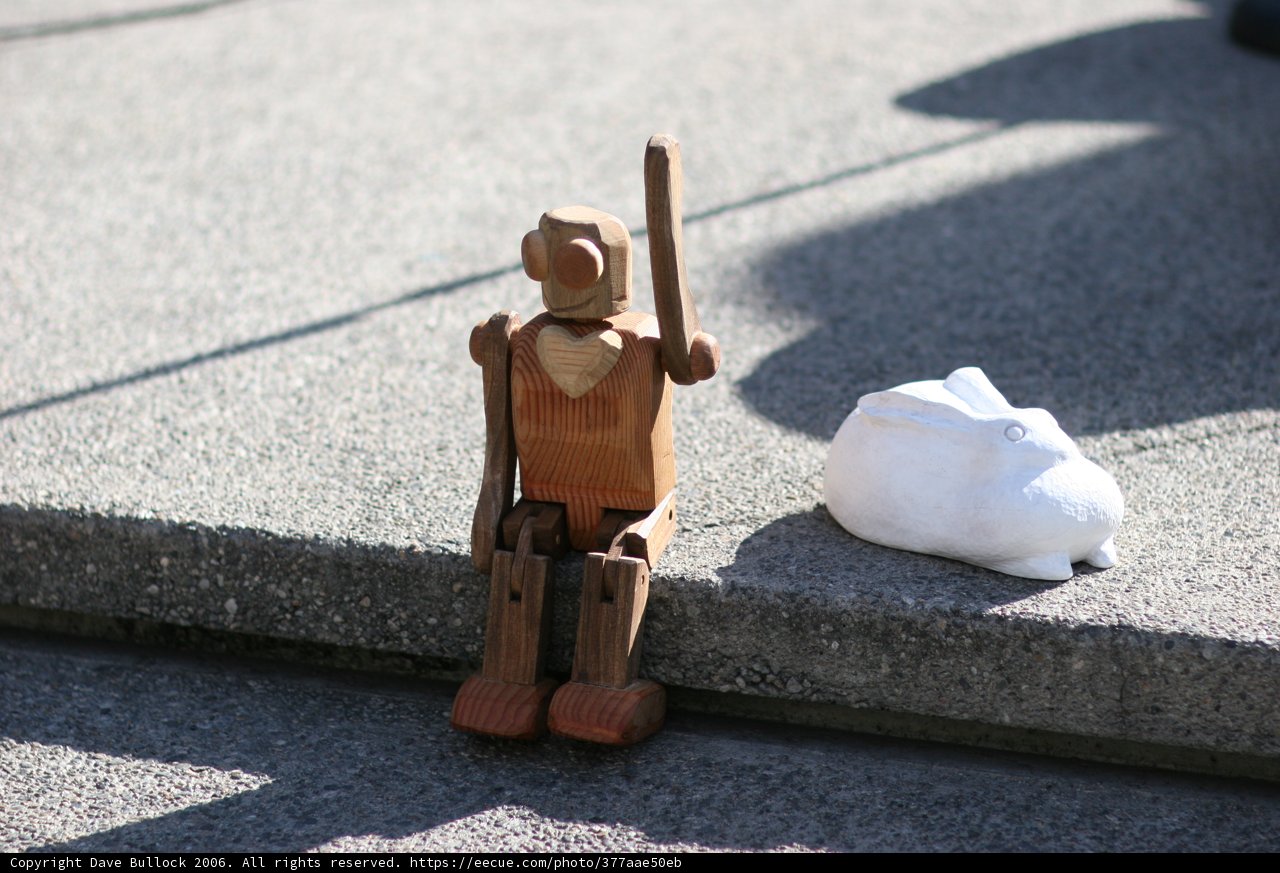 Wooden Toy and White Object
