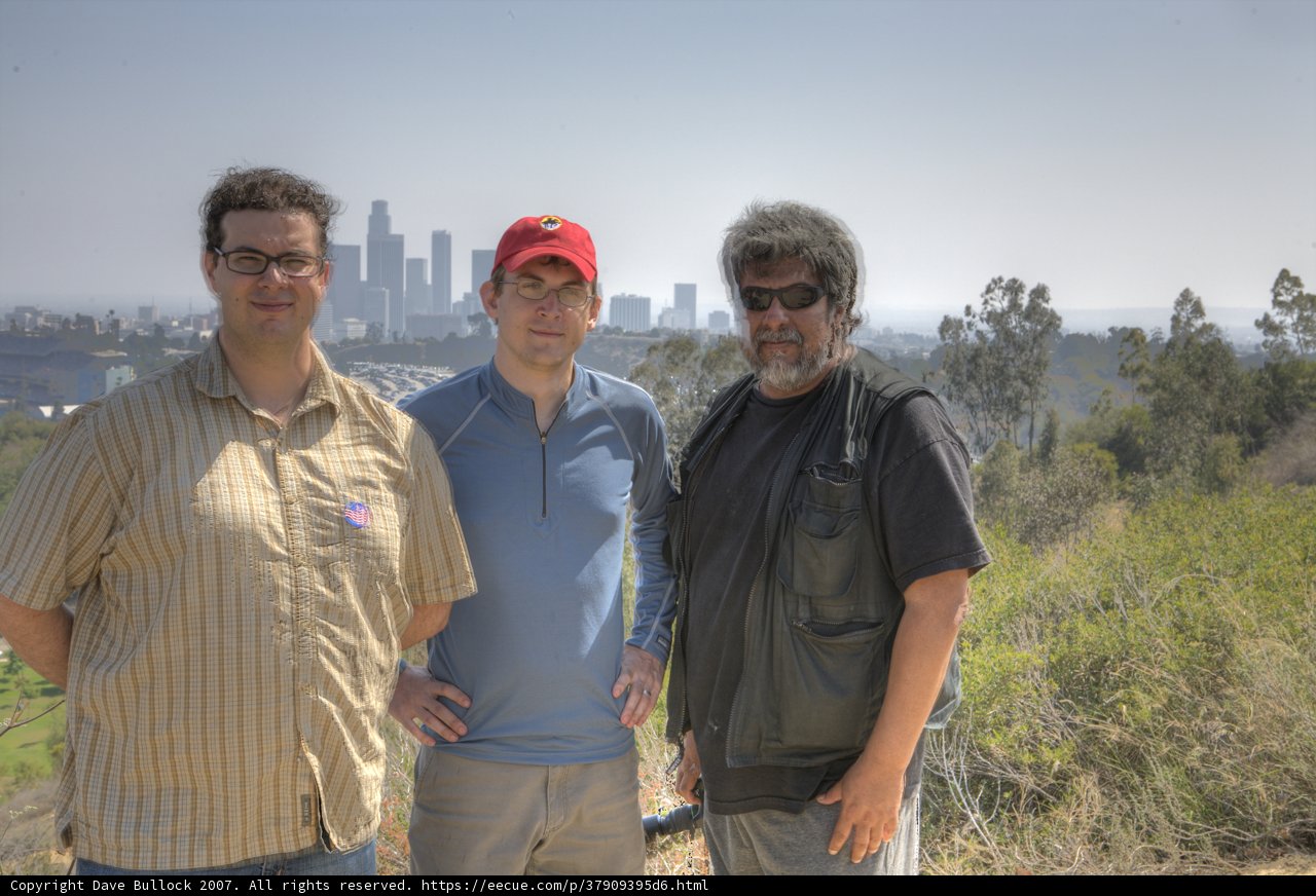 Three Men Enjoying a Picturesque View