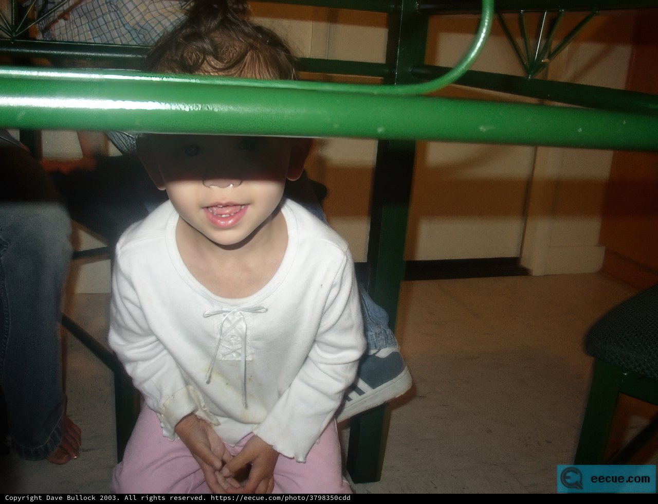 Little girl taking a break in the indoor play area