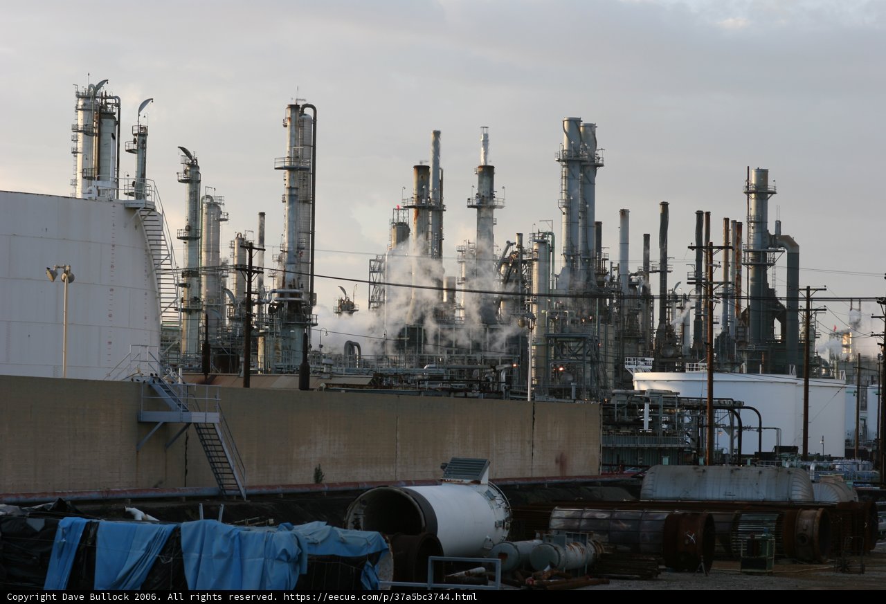 The towering presence of an industrial plant