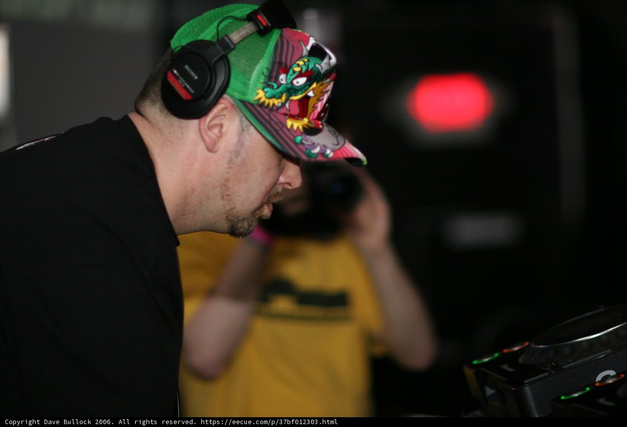 Hat-wearing man rocking the headphones