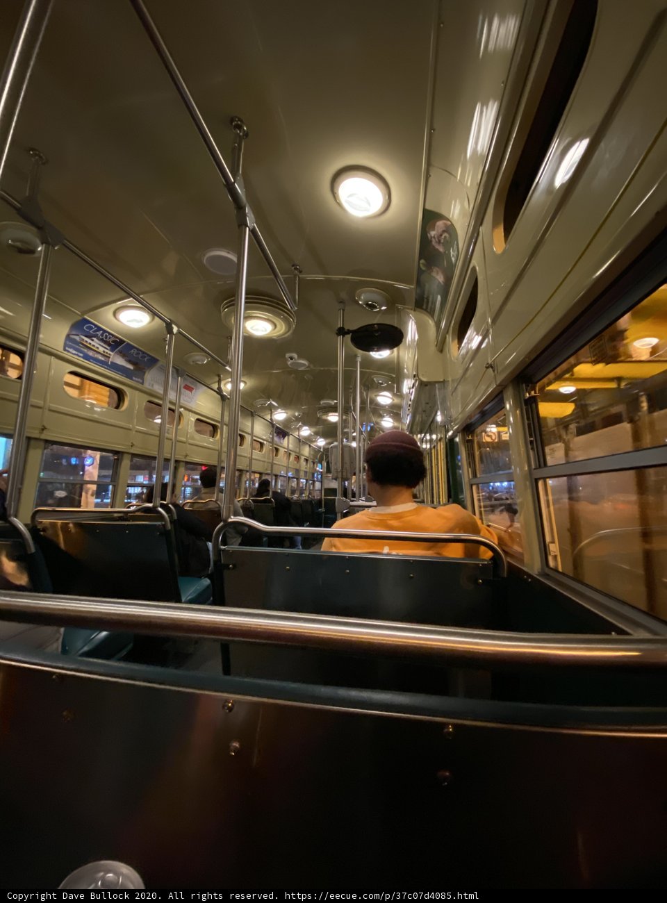 Nighttime Journey on a Busy City Bus