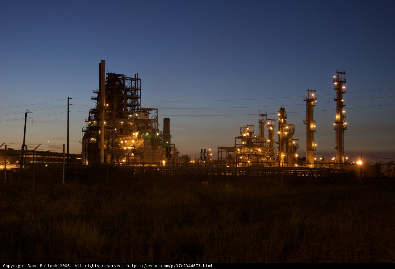 Illuminated Refinery at Night