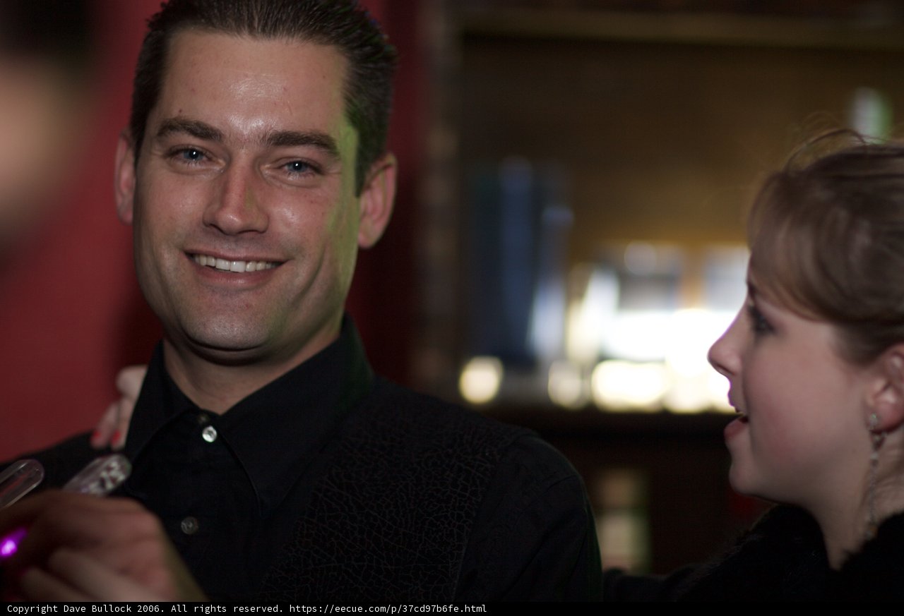 Happy Man with Friends at the Pub