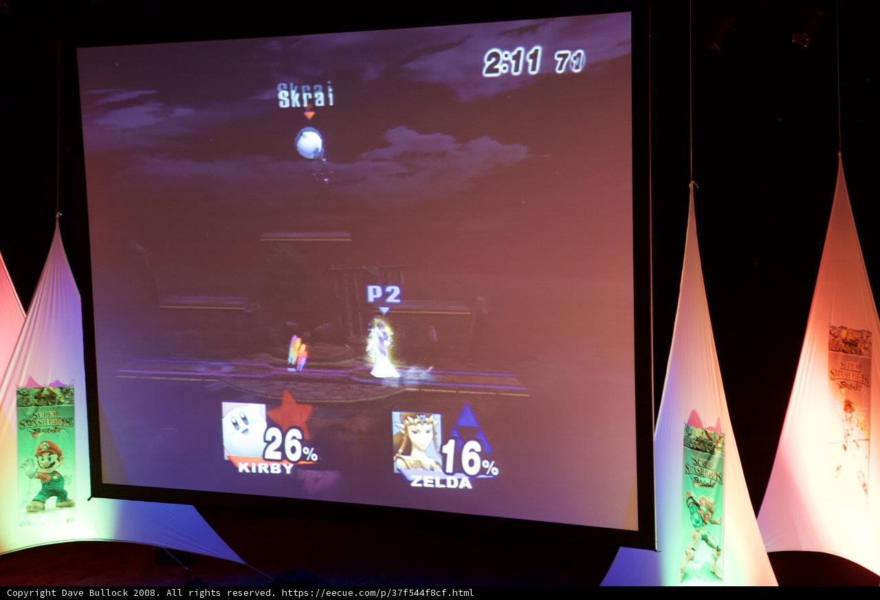Doppo Kunikida playing a video game on stage