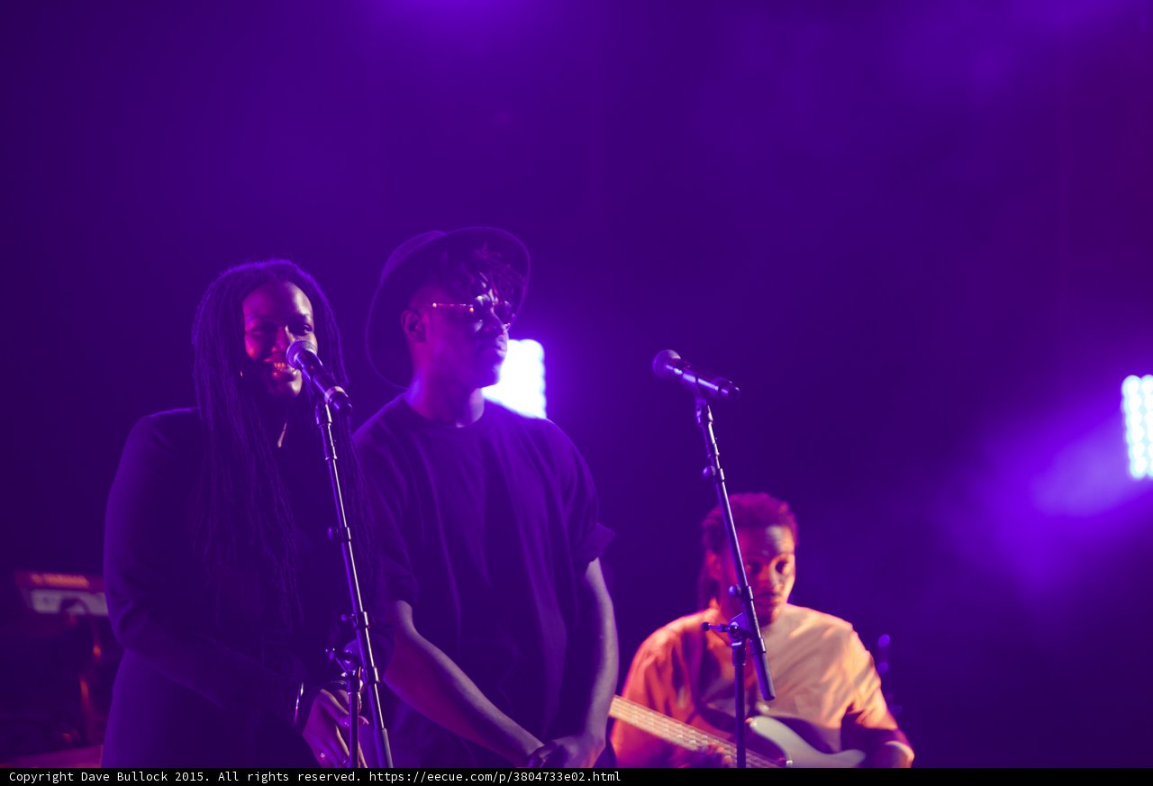 Solange Band Three Musicians Backing Vocalist Dreadlocks Hat Bassist Purple