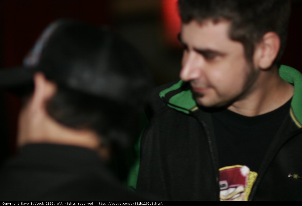 Man in a Black Jacket with Baseball Cap