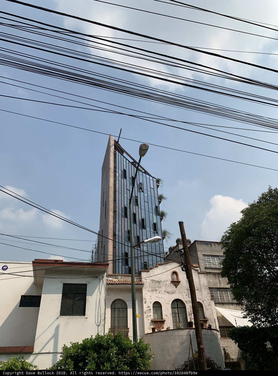 Towering Wires and Cityscape
