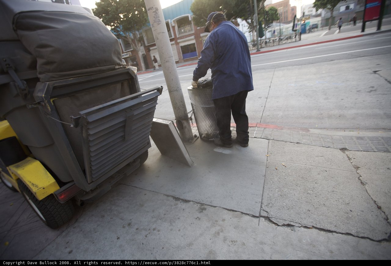 Cleaning the Sidewalk Sign