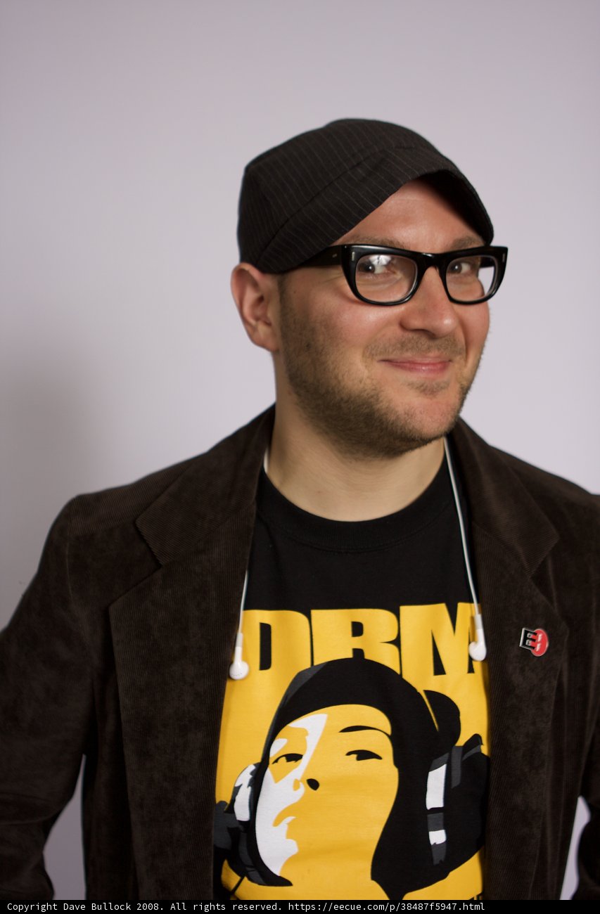 Stylish Man in Black Jacket and Glasses