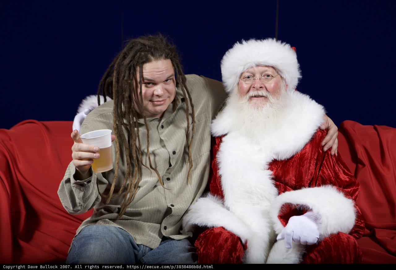 Aaron S Celebrates with Santa Claus at APC Xmas Party