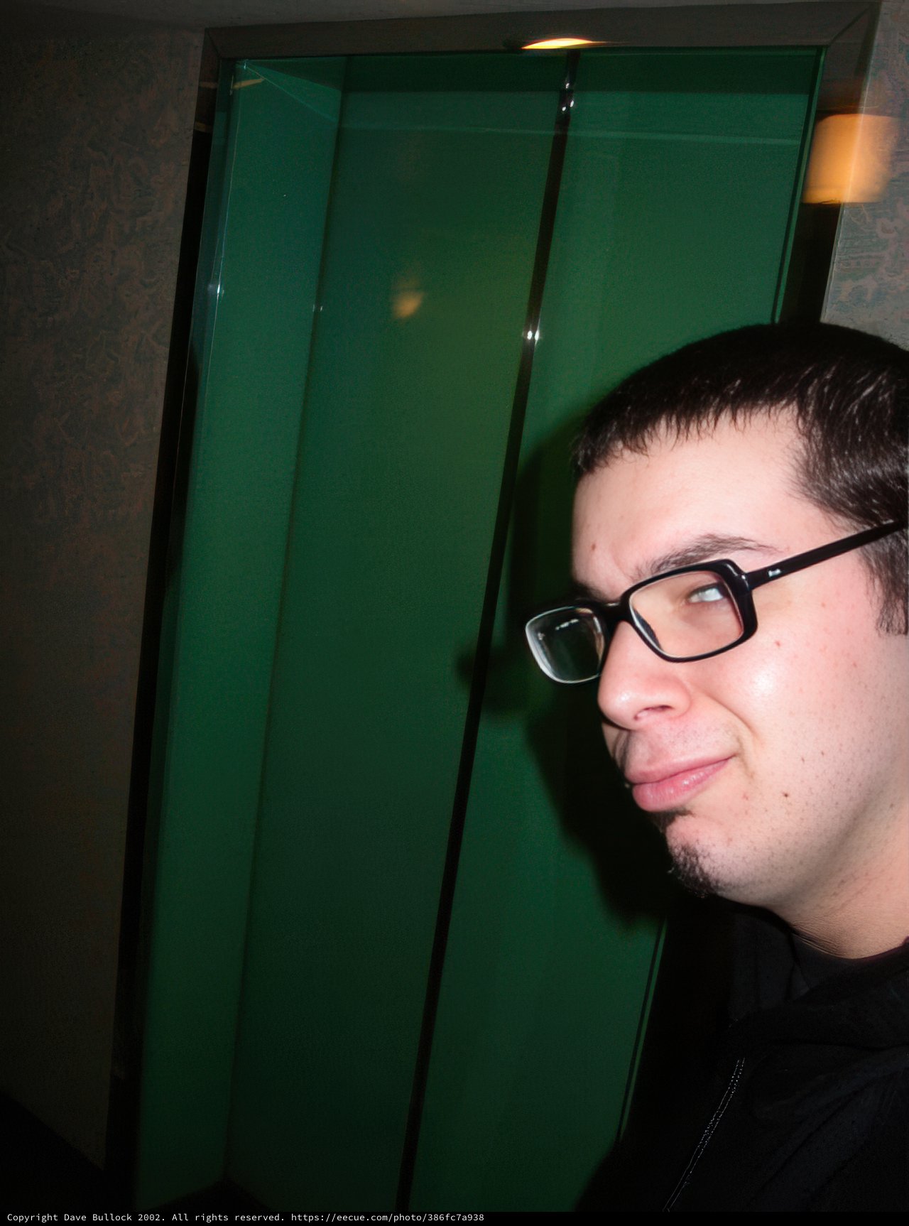 The Man in Glasses and the Green Door