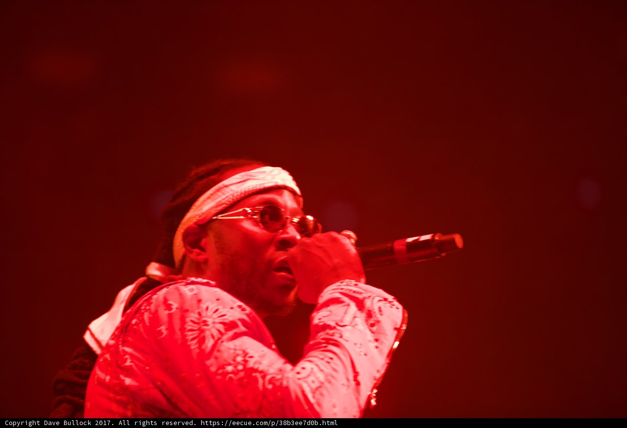 The Red-Clad Solo Performer Rocks the Crowd with his Mic