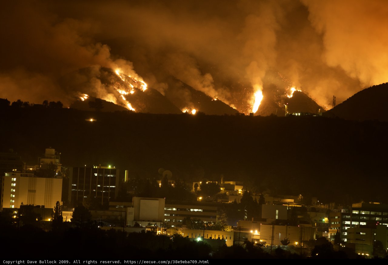 Flames Ignite Above Cityscape