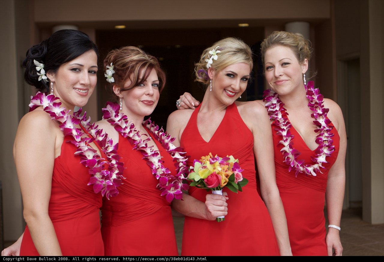 Stunning Bridesmaids in Red Dresses with Beautiful Flower Bouquets