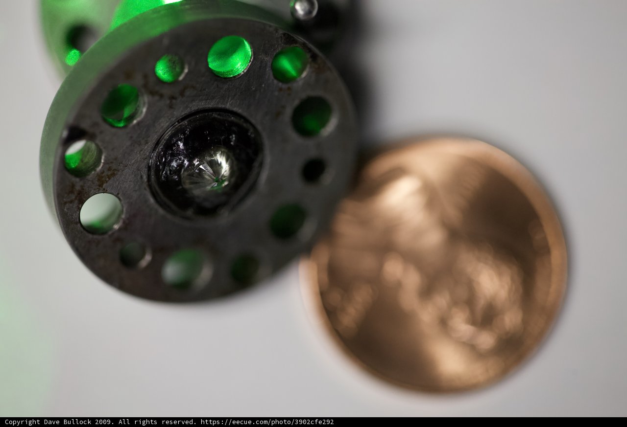 Close Up of Coin and Fly Reel
