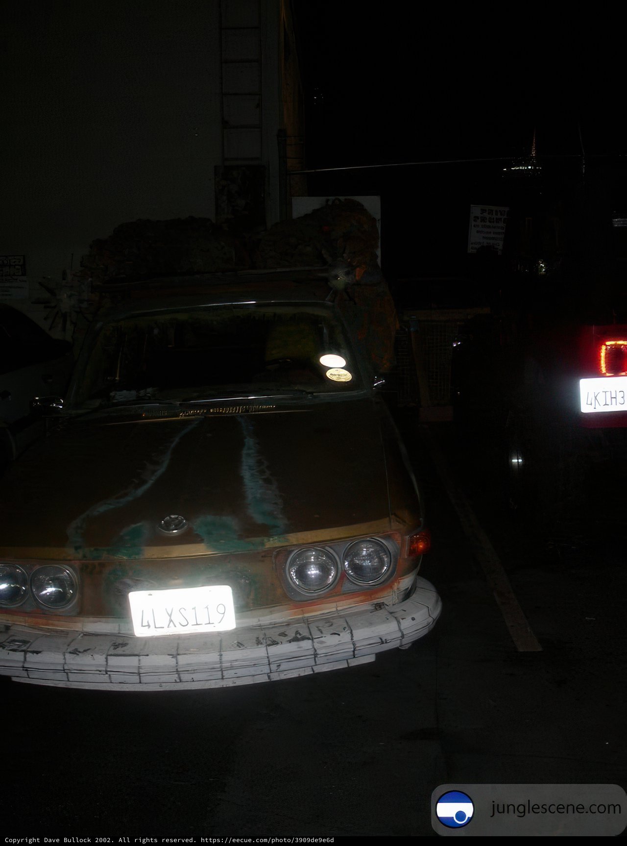 Nighttime Parking Lot with Automobile