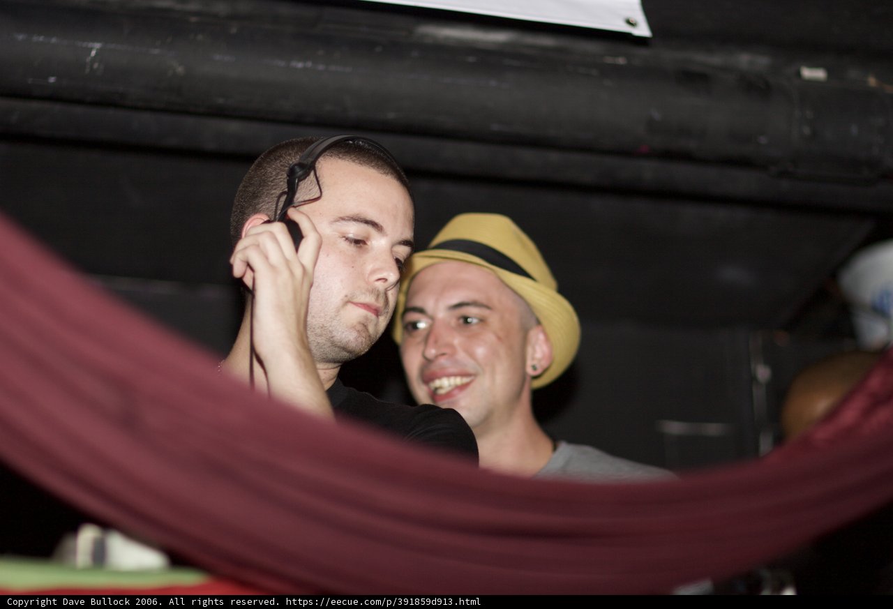 Two Men in a Dark Room