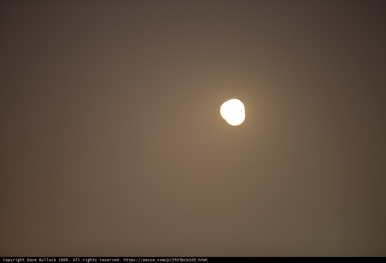 Full Moon in Foggy Night Sky