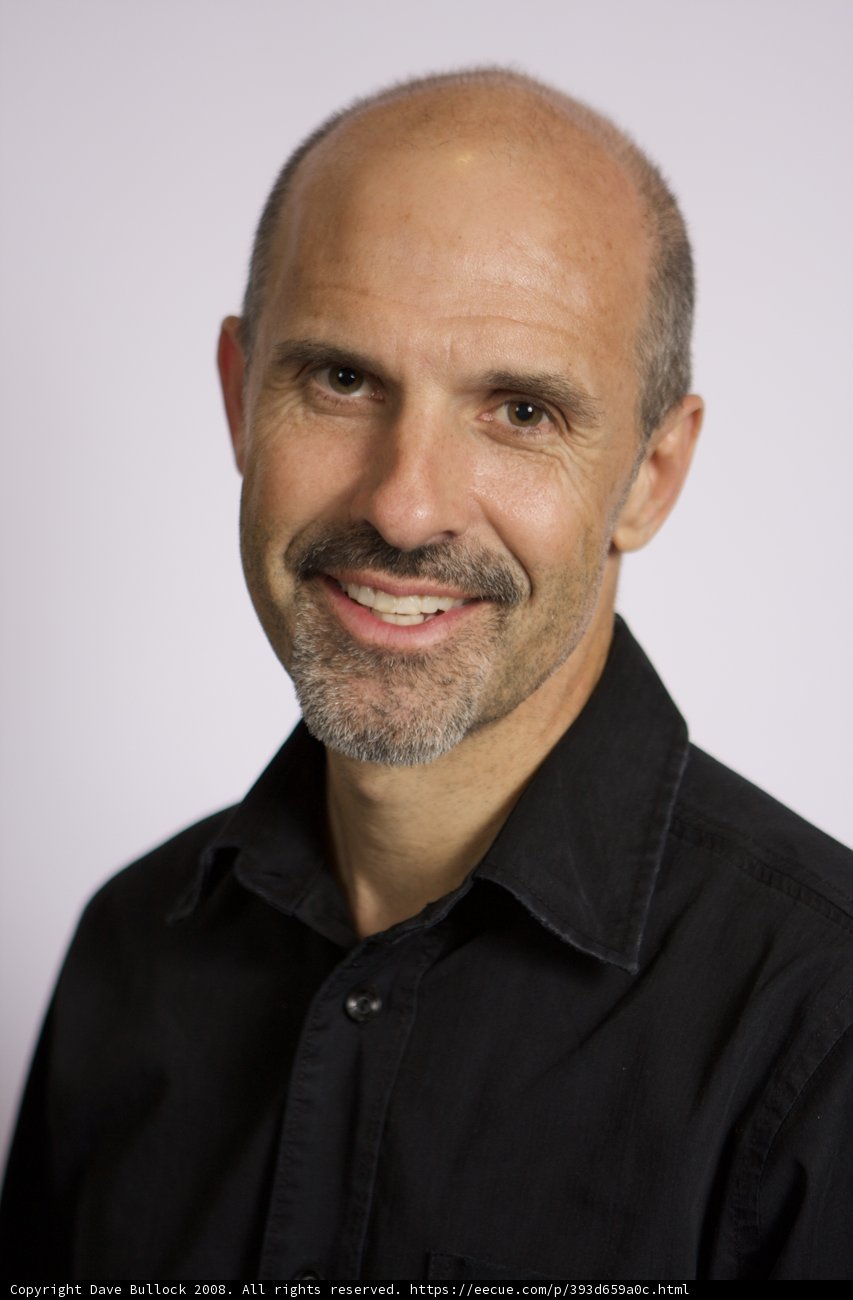 Happy Bald Man in Black