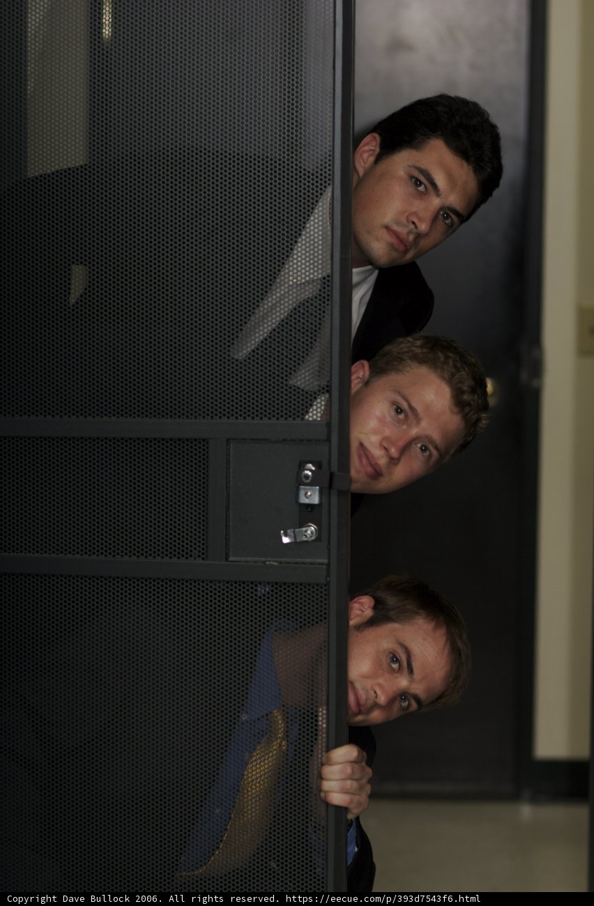 Three Suited Gentlemen in the Elevator