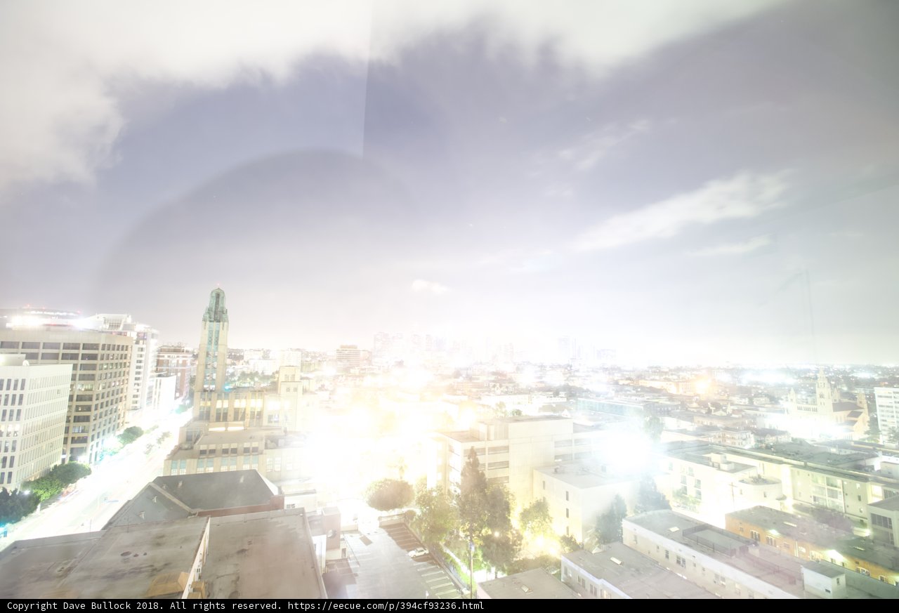 Nighttime Cityscape from a High Rise Window