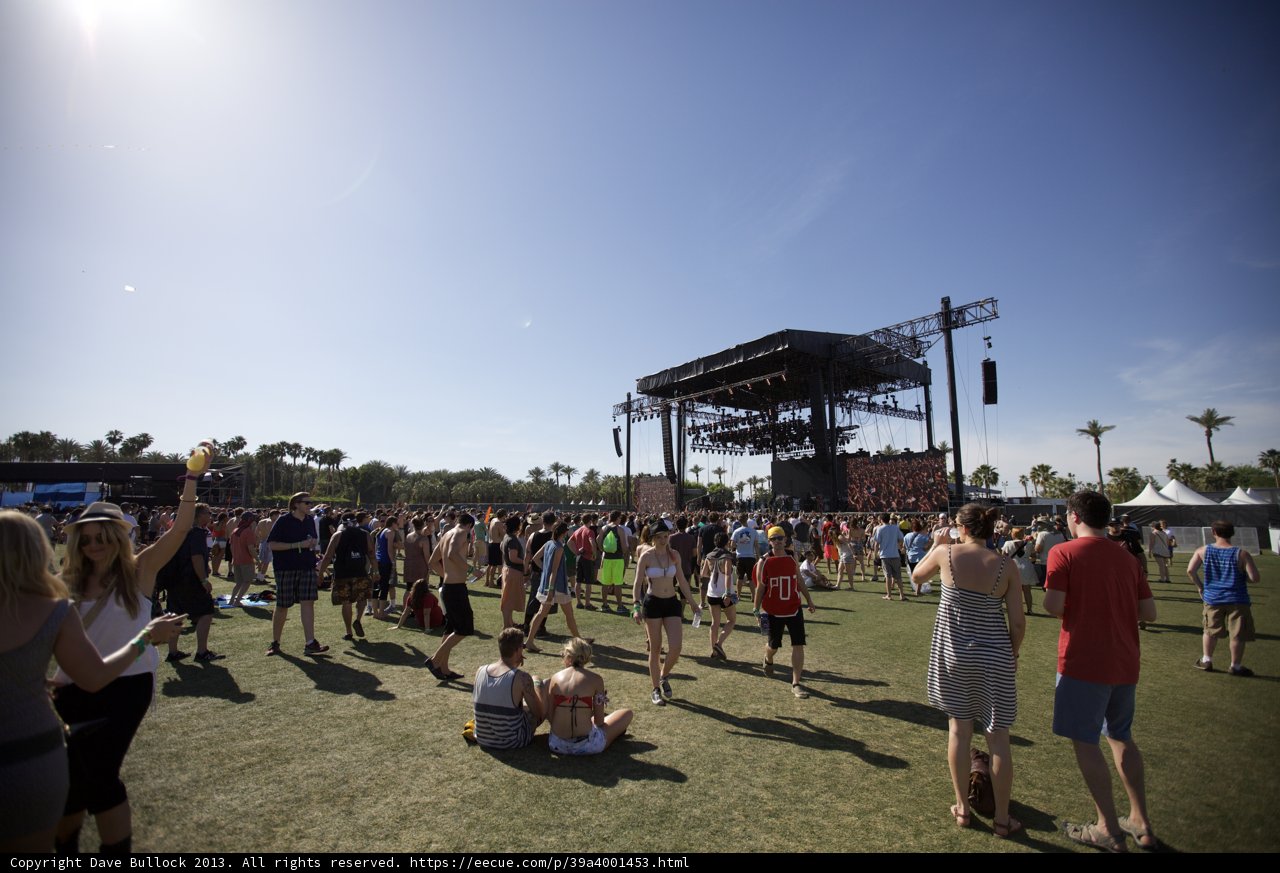 Coachella Crowd Soars Under Blue Sky
