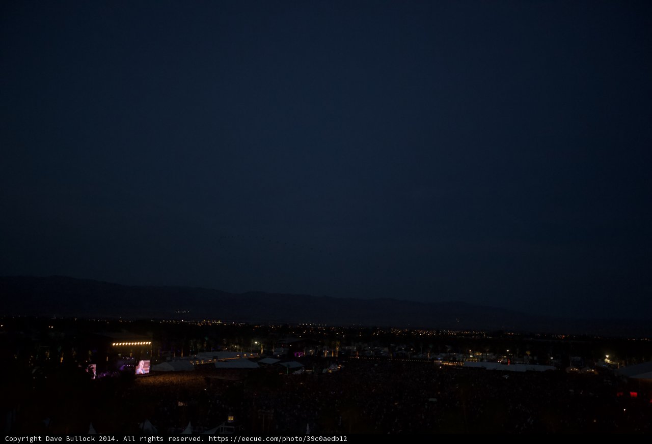 Nighttime Concert with a Mountainous Backdrop