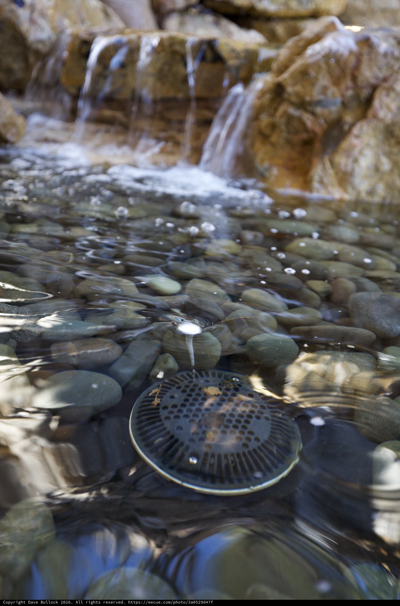 Underwater Fountain Drain with Smooth River Stones