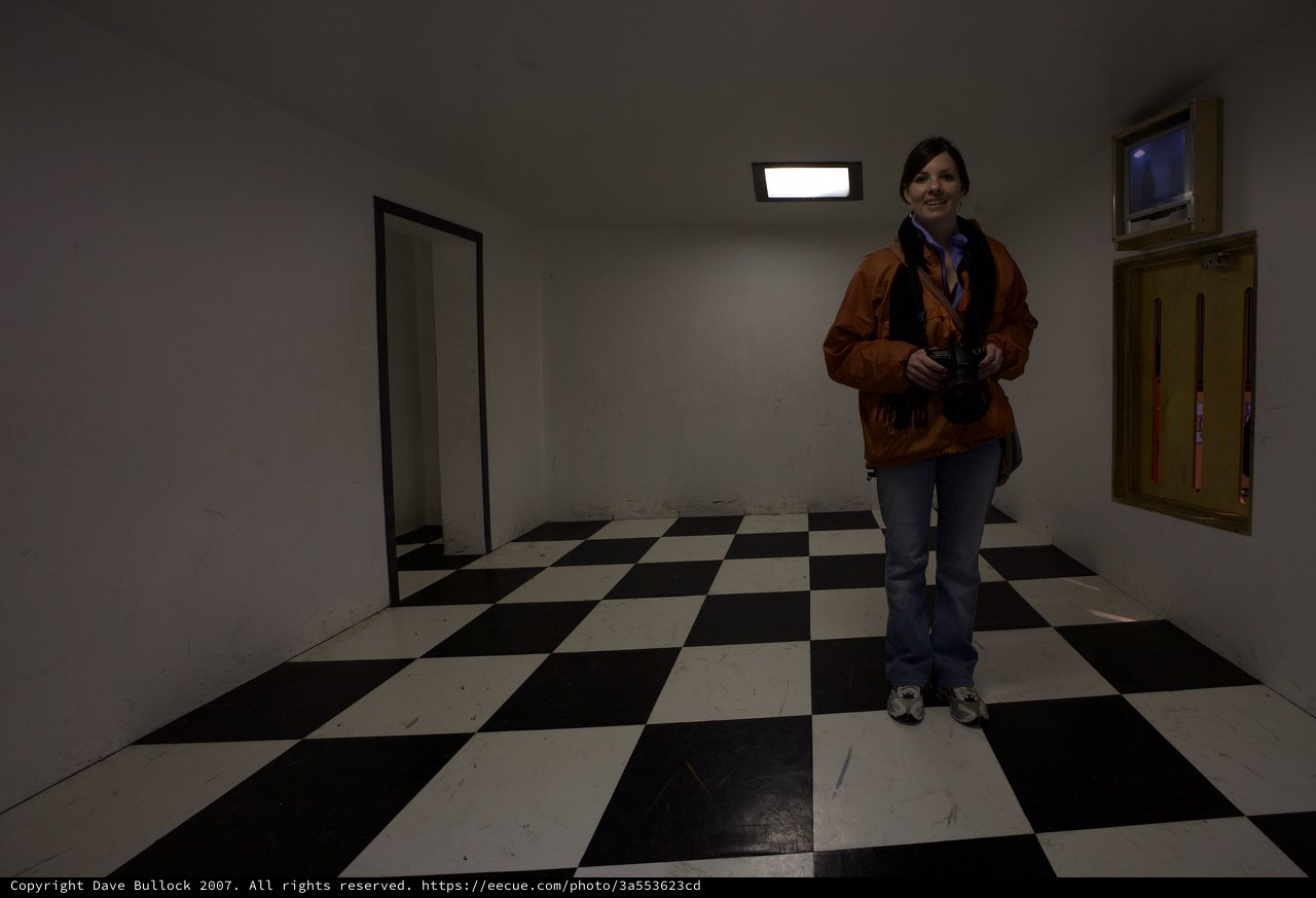 Explorer Smiling in Checkered Room at Exploratorium