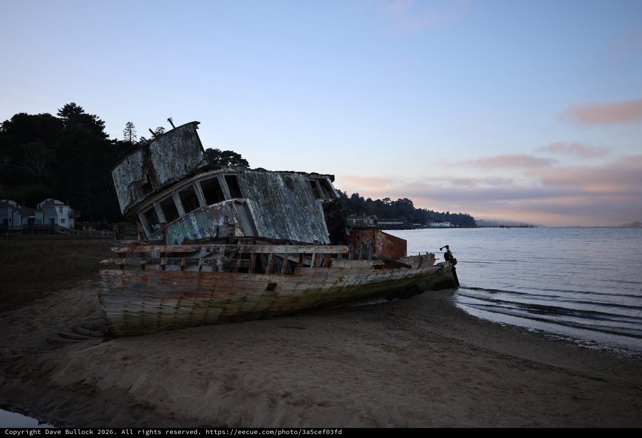 Abandoned Shipwreck on Beach at Twilight