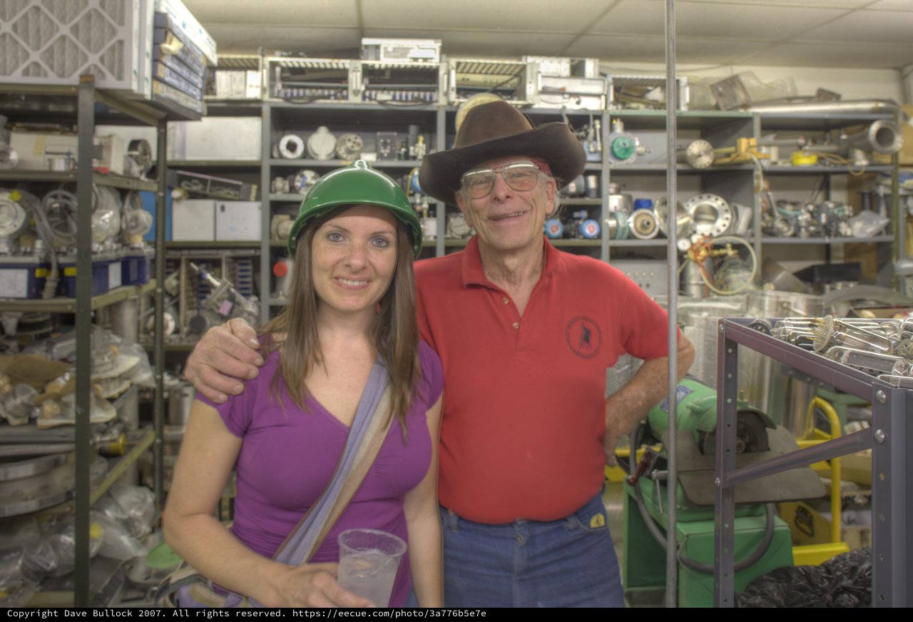 Two Visitors Pose Inside Black Hole Surplus, Santa Fe