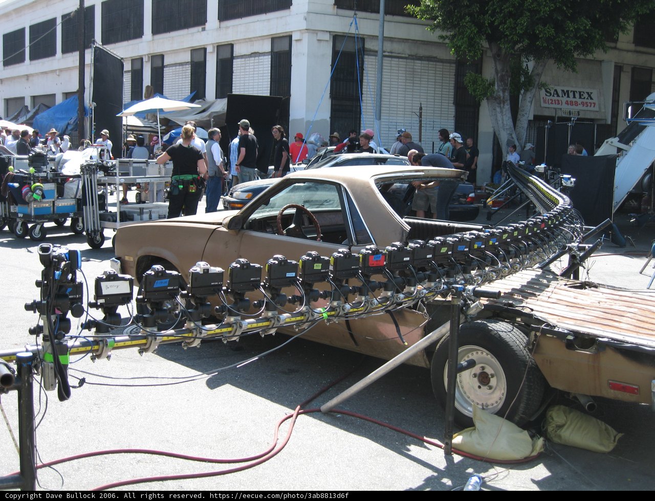Camera-Covered Truck Amongst a Crowd