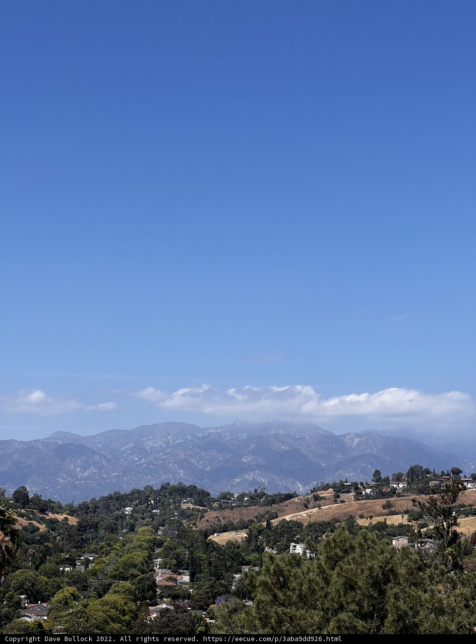 Majestic Mountains in a Cloudy Sky