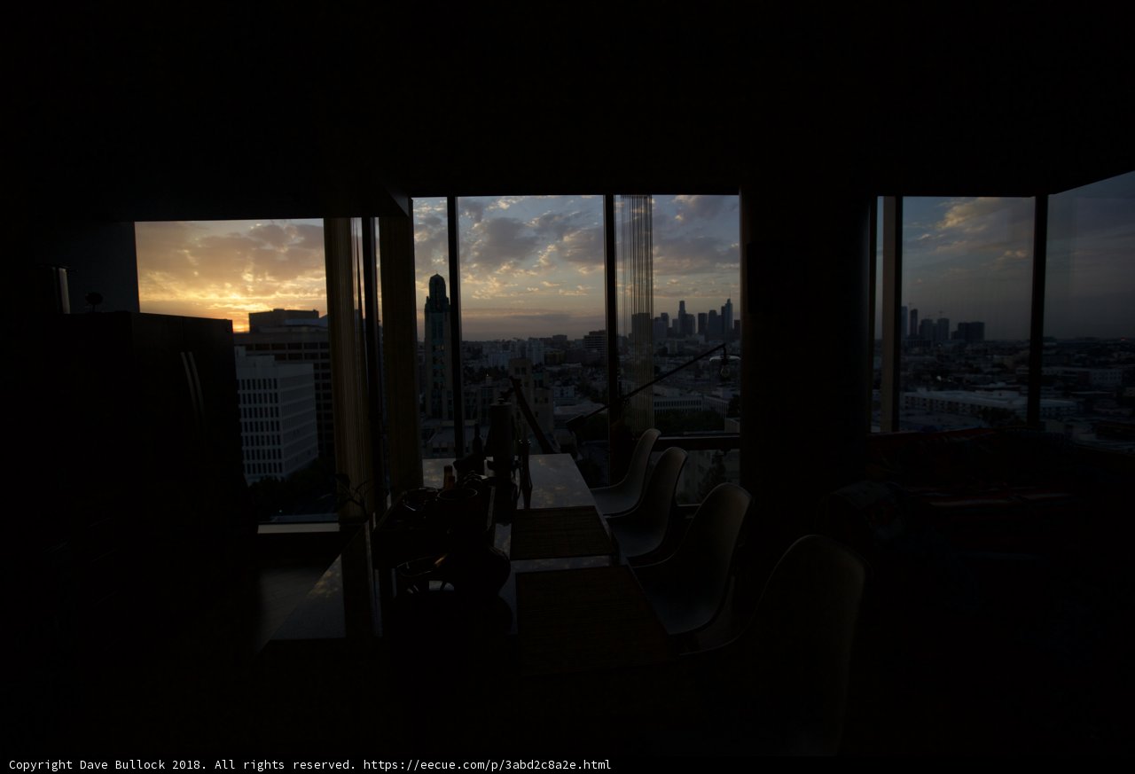 Sunset over the City from a Penthouse Window