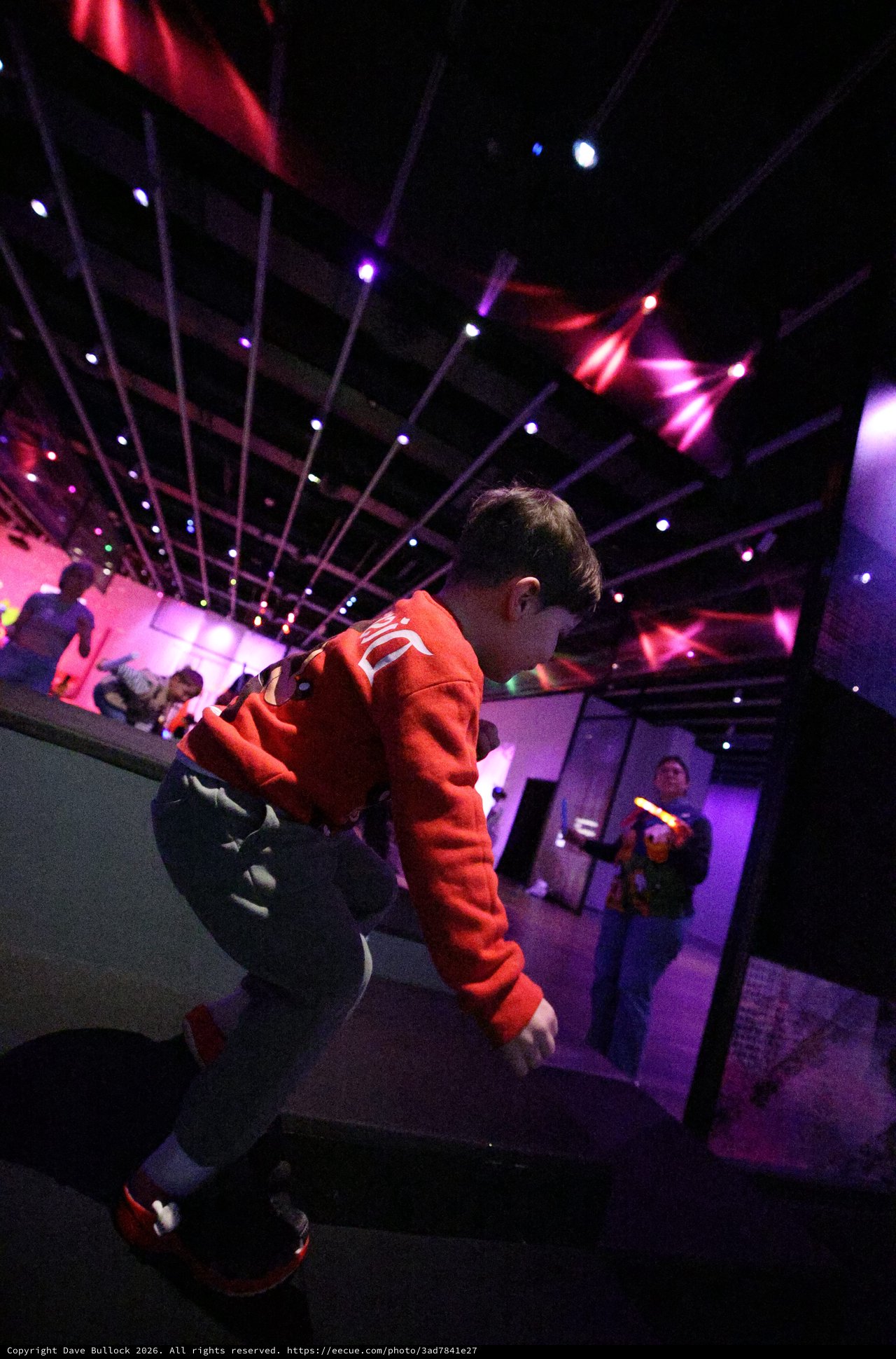 Child in Red Hoodie at Baby Rave Event