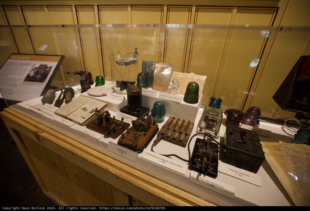 Vintage Telegraph Equipment and Insulators Display in Museum